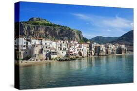 Traditional fishing boats and fishermens houses, Cefalu, Sicily, Italy, Europe-Marco Simoni-Stretched Canvas