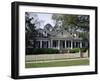 Traditional Home with White Picket Fence-null-Framed Photographic Print