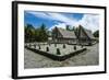 Traditional House with Stone Money in Front-Michael Runkel-Framed Photographic Print