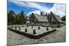 Traditional House with Stone Money in Front-Michael Runkel-Mounted Photographic Print