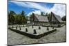 Traditional House with Stone Money in Front-Michael Runkel-Mounted Photographic Print