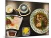 Traditional Japanese Meal of Sushi and Fish Head, Tokyo, Honshu Island, Japan-Kober Christian-Mounted Photographic Print