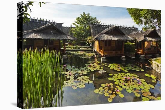 Traditional Kampung Style Rooms over Carp Ponds at the Kampung Sumber Alam Hot Springs Hotel-Rob-Stretched Canvas