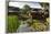 Traditional Kampung Style Rooms over Carp Ponds at the Kampung Sumber Alam Hot Springs Hotel-Rob-Framed Photographic Print