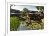 Traditional Kampung Style Rooms over Carp Ponds at the Kampung Sumber Alam Hot Springs Hotel-Rob-Framed Photographic Print