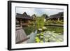 Traditional Kampung Style Rooms over Carp Ponds at the Kampung Sumber Alam Hot Springs Hotel-Rob-Framed Photographic Print