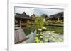 Traditional Kampung Style Rooms over Carp Ponds at the Kampung Sumber Alam Hot Springs Hotel-Rob-Framed Photographic Print