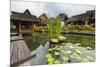 Traditional Kampung Style Rooms over Carp Ponds at the Kampung Sumber Alam Hot Springs Hotel-Rob-Mounted Photographic Print