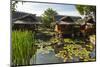 Traditional Kampung Style Rooms over Carp Ponds at the Kampung Sumber Alam Hot Springs Hotel-Rob-Mounted Photographic Print