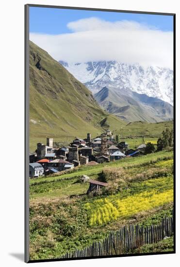 Traditional medieval Svanetian tower houses, Ushguli village, Shkhara Moutains behind, Svaneti regi-G&M Therin-Weise-Mounted Photographic Print