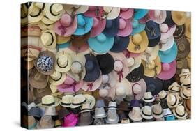 Traditional Panama hats and Sombreros for sale at a street market in Cartagena, Colombia-Alex Treadway-Stretched Canvas