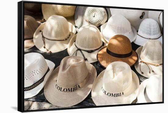 Traditional Panama hats for sale at a street market in Cartagena, Colombia, South America-Alex Treadway-Framed Stretched Canvas