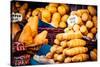 Traditional Polish Smoked Cheese Oscypek on Outdoor Market in Krakow, Poland.-Curioso Travel Photography-Stretched Canvas
