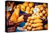 Traditional Polish Smoked Cheese Oscypek on Outdoor Market in Krakow, Poland.-Curioso Travel Photography-Stretched Canvas