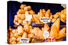 Traditional Polish Smoked Cheese Oscypek on Outdoor Market in Krakow, Poland.-Curioso Travel Photography-Stretched Canvas