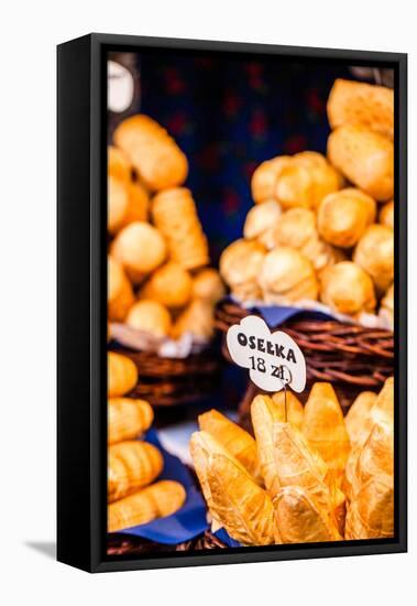 Traditional Polish Smoked Cheese Oscypek on Outdoor Market in Krakow, Poland.-Curioso Travel Photography-Framed Stretched Canvas