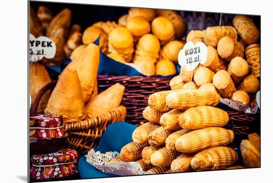 Traditional Polish Smoked Cheese Oscypek on Outdoor Market in Krakow, Poland.-Curioso Travel Photography-Mounted Photographic Print