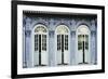 Traditional shophouse windows open out onto a street in the Orchard Road neighborhood in Singapore-Logan Brown-Framed Photographic Print