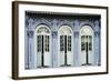 Traditional shophouse windows open out onto a street in the Orchard Road neighborhood in Singapore-Logan Brown-Framed Photographic Print