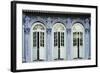 Traditional shophouse windows open out onto a street in the Orchard Road neighborhood in Singapore-Logan Brown-Framed Photographic Print