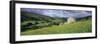 Traditional stone barn and buttercup meadow in Swaledale with stormy sky-Stuart Black-Framed Photographic Print