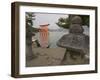 Traditional Stone Candle Stands with Floating Torii Beyond, Itsuku Shima Jinja, Honshu, Japan-Simanor Eitan-Framed Photographic Print