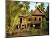 Traditional Thai House on Stilts Above the River in Bangkok, Thailand, Southeast Asia-Sassoon Sybil-Mounted Photographic Print