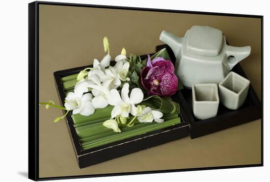 Traditional Thai Tea Pot and Cups with Orchid Arrangement, Bangkok, Thailand-Cindy Miller Hopkins-Framed Stretched Canvas