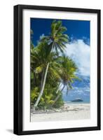 Traditional wood carved boat in the Aitutaki lagoon, Rarotonga and the Cook Islands, South Pacific,-Michael Runkel-Framed Photographic Print