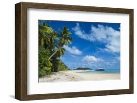 Traditional wood carved boat in the Aitutaki lagoon, Rarotonga and the Cook Islands, South Pacific,-Michael Runkel-Framed Photographic Print