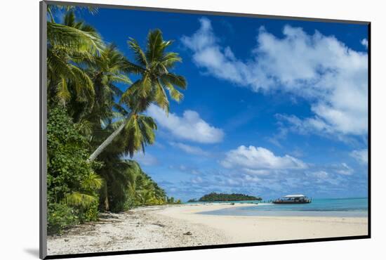 Traditional wood carved boat in the Aitutaki lagoon, Rarotonga and the Cook Islands, South Pacific,-Michael Runkel-Mounted Photographic Print