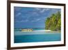 Traditional wood carved boat in the Aitutaki lagoon, Rarotonga and the Cook Islands, South Pacific,-Michael Runkel-Framed Photographic Print