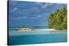 Traditional wood carved boat in the Aitutaki lagoon, Rarotonga and the Cook Islands, South Pacific,-Michael Runkel-Stretched Canvas