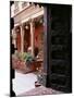 Traditional Wood Door and 19th Century Floor Tiles in Restored Traditional Pol House-John Henry Claude Wilson-Mounted Photographic Print