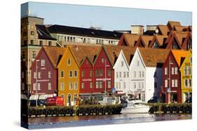 Traditional Wooden Hanseatic Merchants Buildings of the Bryggen, in Harbour, Bergen, Norway-Robert Harding-Stretched Canvas