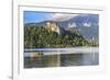 Traditional wooden pletnja rowing boat to ferry tourists to St. Mary's Church of Assumption on the-Miva Stock-Framed Photographic Print