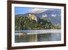 Traditional wooden pletnja rowing boat to ferry tourists to St. Mary's Church of Assumption on the-Miva Stock-Framed Photographic Print