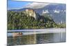 Traditional wooden pletnja rowing boat to ferry tourists to St. Mary's Church of Assumption on the-Miva Stock-Mounted Photographic Print