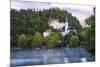 Traditional wooden pletnja rowing boat used to ferry tourists to St. Mary's Church of Assumption on-Miva Stock-Mounted Photographic Print