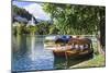 Traditional wooden pletnja rowing boat used to ferry tourists to St. Mary's Church of Assumption on-Miva Stock-Mounted Photographic Print