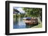 Traditional wooden pletnja rowing boat used to ferry tourists to St. Mary's Church of Assumption on-Miva Stock-Framed Photographic Print