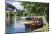 Traditional wooden pletnja rowing boat used to ferry tourists to St. Mary's Church of Assumption on-Miva Stock-Mounted Photographic Print