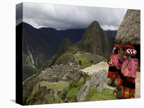 Traditionally Dressed Children Looking over the Ruins of Machu Picchu, UNESCO World Heritage Site, -Simon Montgomery-Stretched Canvas