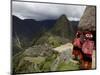 Traditionally Dressed Children Looking over the Ruins of Machu Picchu, UNESCO World Heritage Site, -Simon Montgomery-Mounted Photographic Print