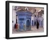 Traditionally Dressed Muslims in the Plaza Alhaouta, Morocco-Merrill Images-Framed Photographic Print