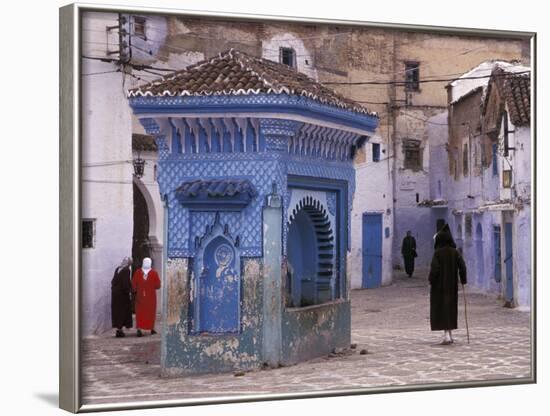 Traditionally Dressed Muslims in the Plaza Alhaouta, Morocco-Merrill Images-Framed Photographic Print