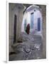 Traditionally Dressed Woman along Cobblestone Alley, Morocco-Merrill Images-Framed Photographic Print