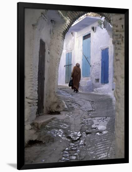 Traditionally Dressed Woman along Cobblestone Alley, Morocco-Merrill Images-Framed Photographic Print