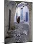 Traditionally Dressed Woman along Cobblestone Alley, Morocco-Merrill Images-Mounted Photographic Print