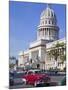 Traditonal Old American Cars Passing the Capitolio Building, Havana, Cuba, West Indies, Caribbean-Martin Child-Mounted Photographic Print